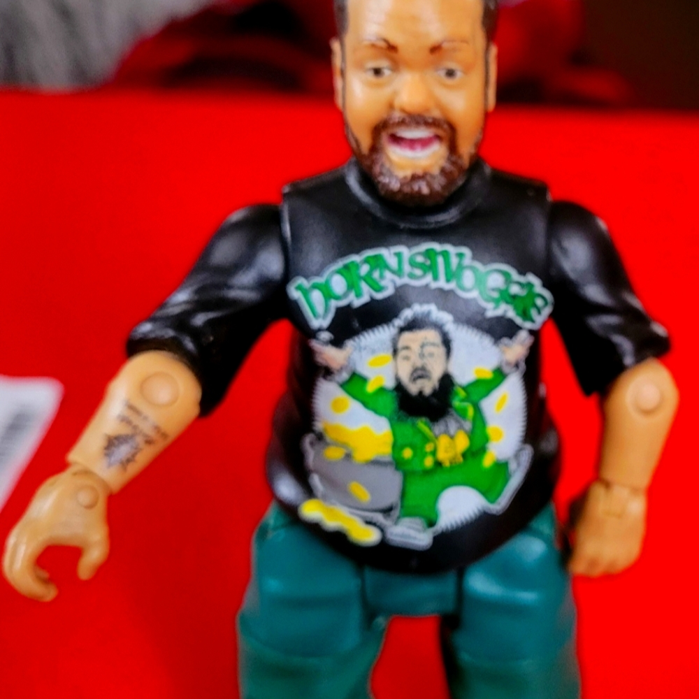 Wwe hornswoggle elite action figure.